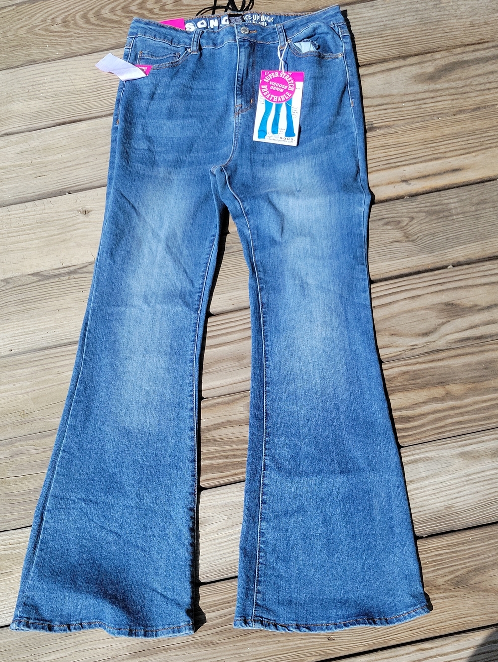 High-Rise Blue Flare Jeans with Stretch — Classic Flared Silhouette Lace Up Back